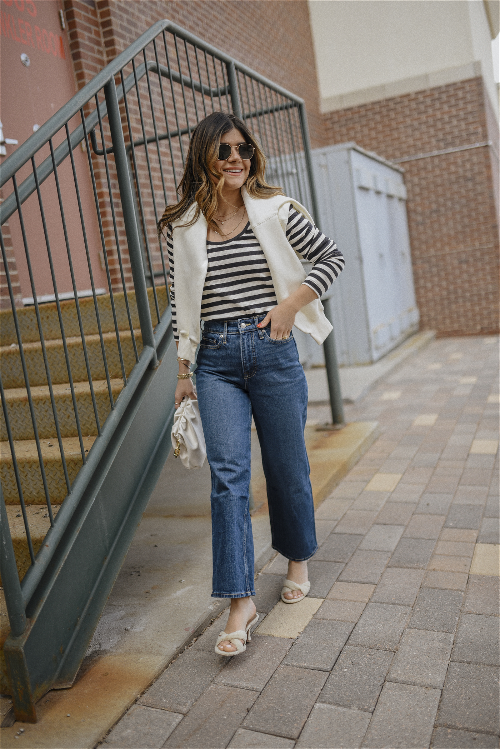 Carolina Hellal of Chic Talk wearing a Free Assembly stripe top, and cropped jeans via Walmart. 