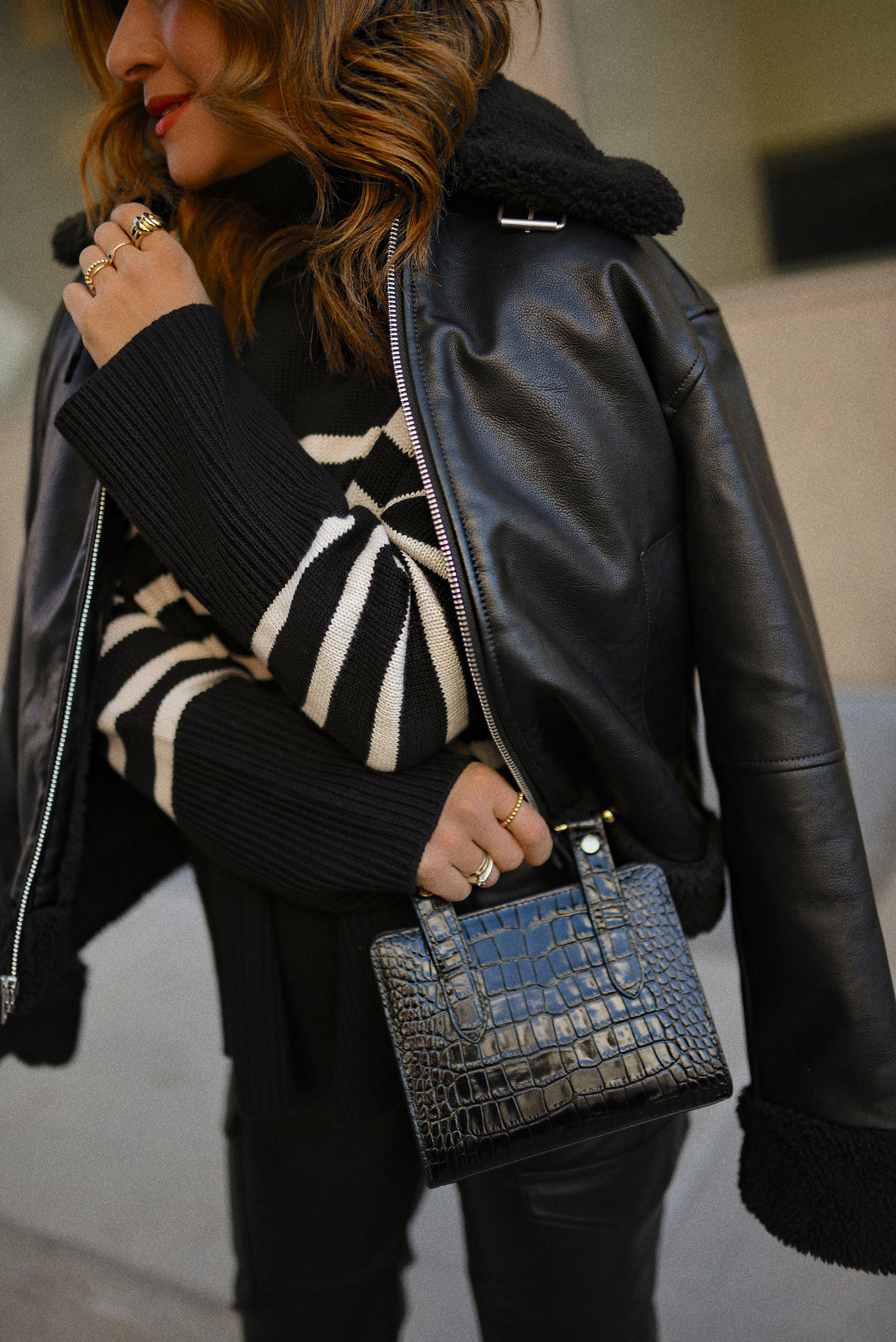 CAROLINA HELLAL OF CHIC TALK WEARING GAP VEGAN LEATHER CARGO PANTS, STRIPPED SWEATER, AVIATOR JACKET, SILVER PUMPS AND STRATHBERRY LEATHER HANDBAG