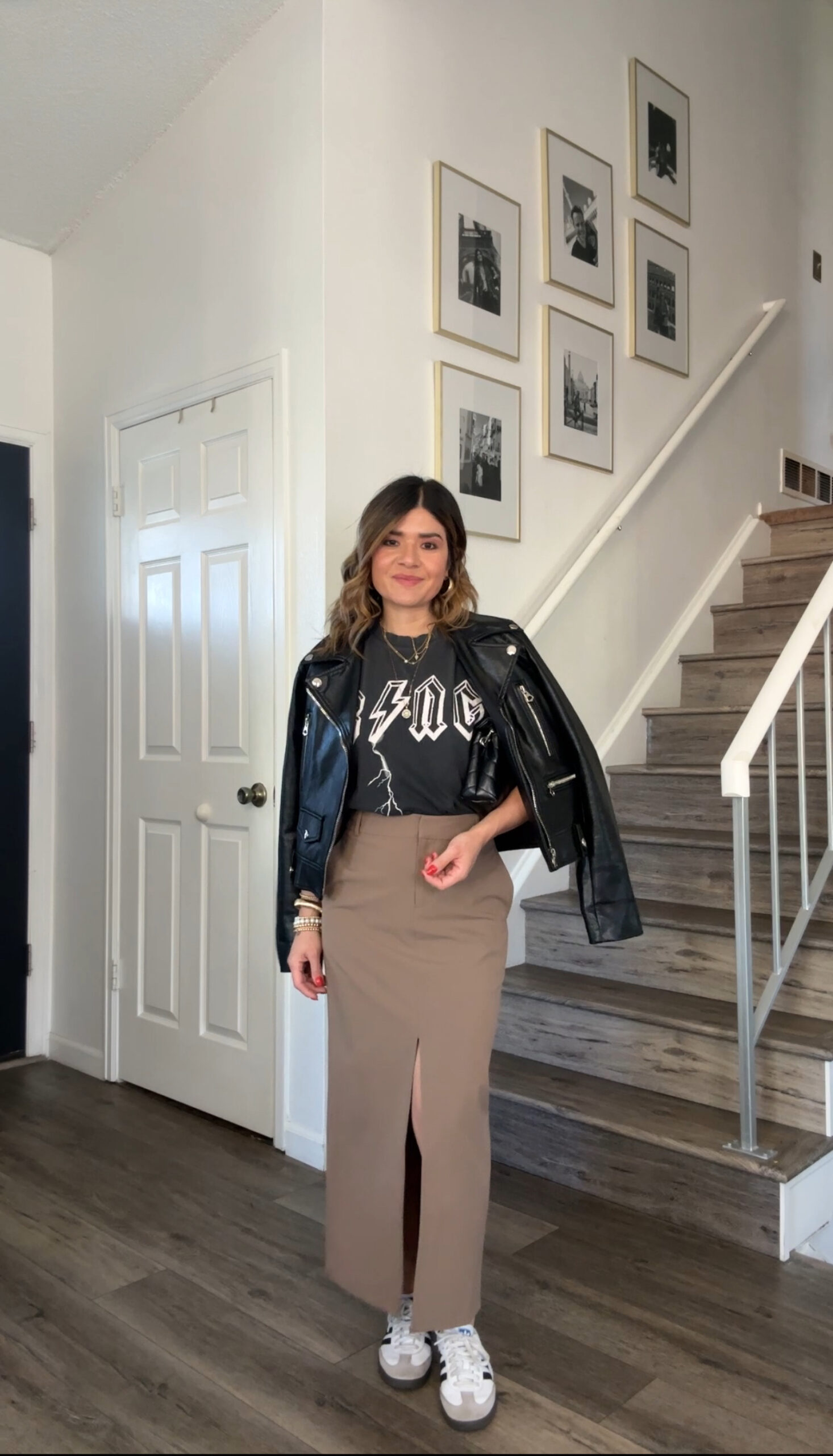 Carolina Hellal of Chic Talk wearing a nude mini skirt and a faux leather jacket from Nordstrom, a Annie Bing tshirt, Adidas Samba OG and YSL bag