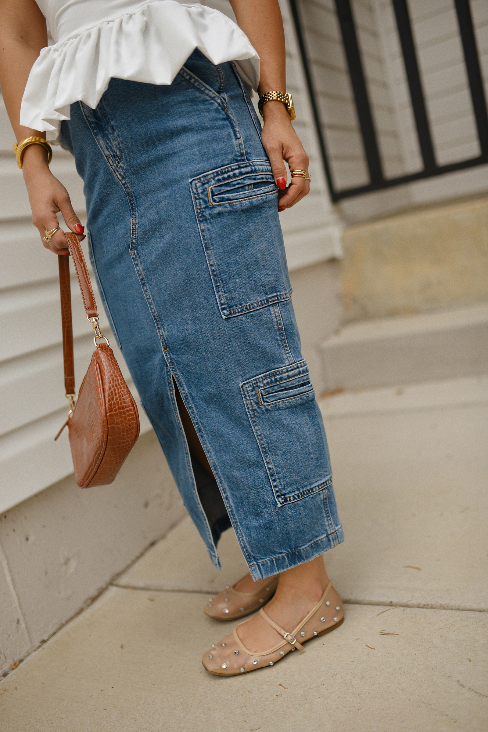 Carolina Hellal of Chic Talk wearing a perfect peplum top via Amazon, Hudson jeans midi cargo skirt, Sam Edelman Mary Jane shoes and Amazon brown shoulder bag