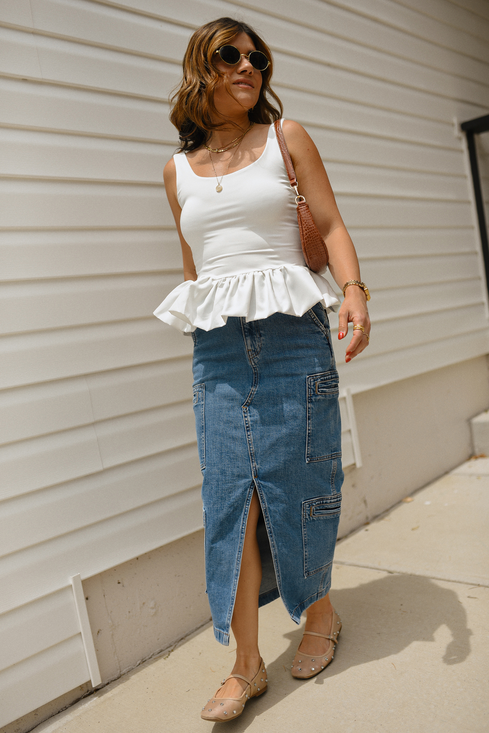 Carolina Hellal of Chic Talk wearing a perfect peplum top via Amazon, Hudson jeans midi cargo skirt, Sam Edelman Mary Jane shoes and Amazon brown shoulder bag