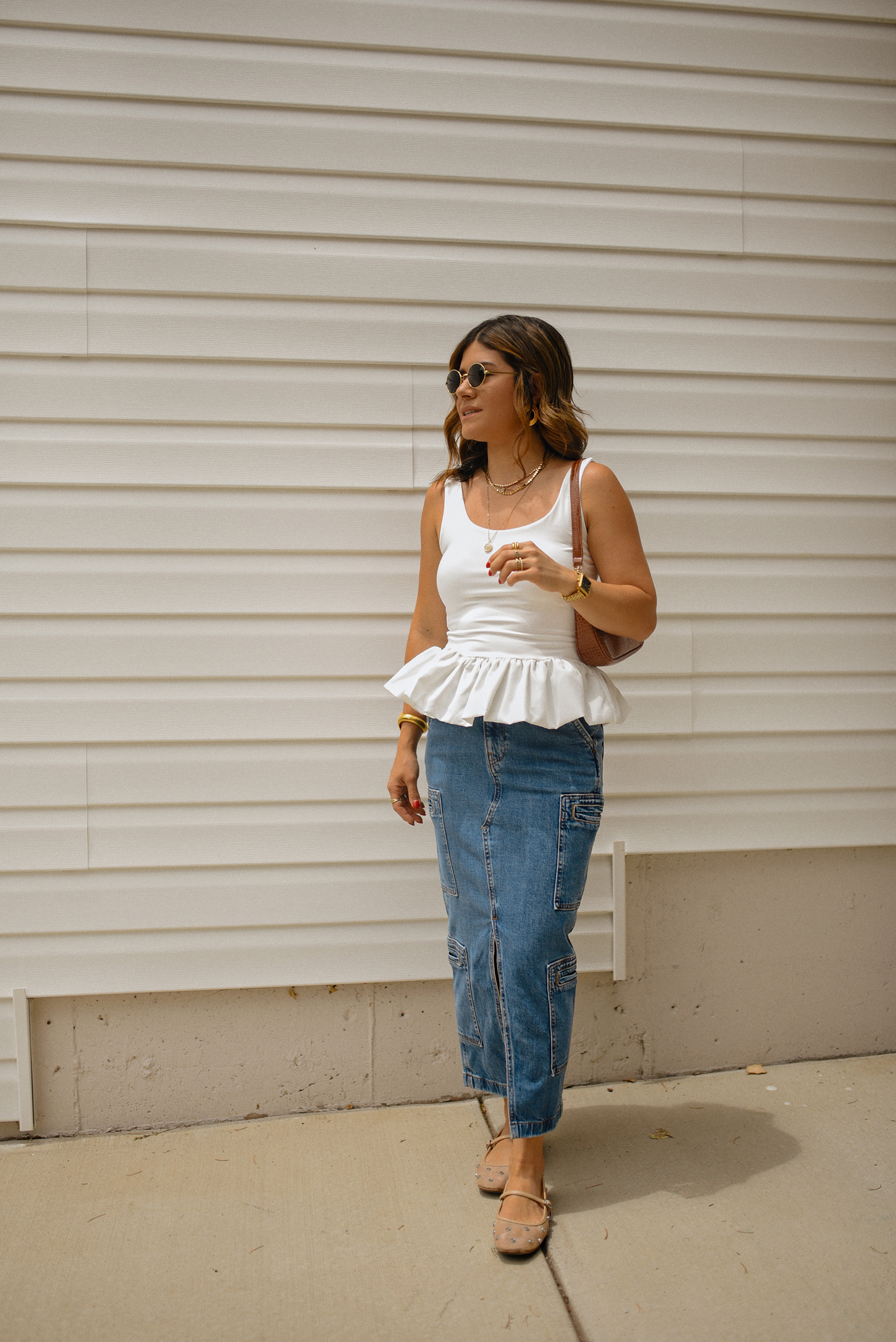 Carolina Hellal of Chic Talk wearing a perfect peplum top via Amazon, Hudson jeans midi cargo skirt, Sam Edelman Mary Jane shoes and Amazon brown shoulder bag