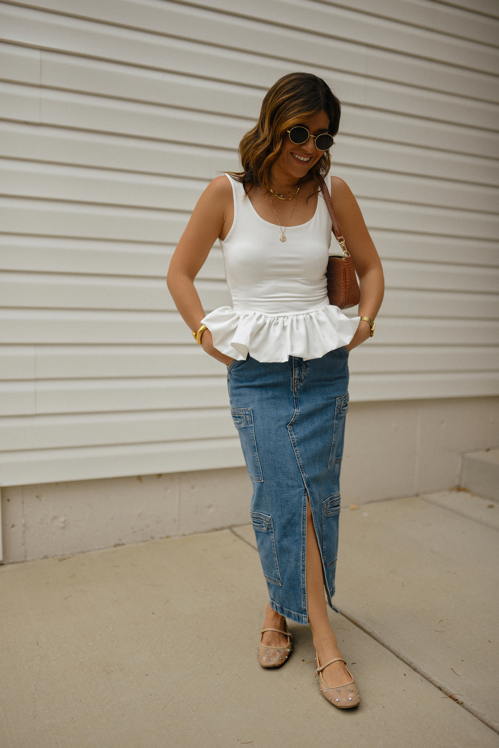 Carolina Hellal of Chic Talk wearing a perfect peplum top via Amazon, Hudson jeans midi cargo skirt, Sam Edelman Mary Jane shoes and Amazon brown shoulder bag