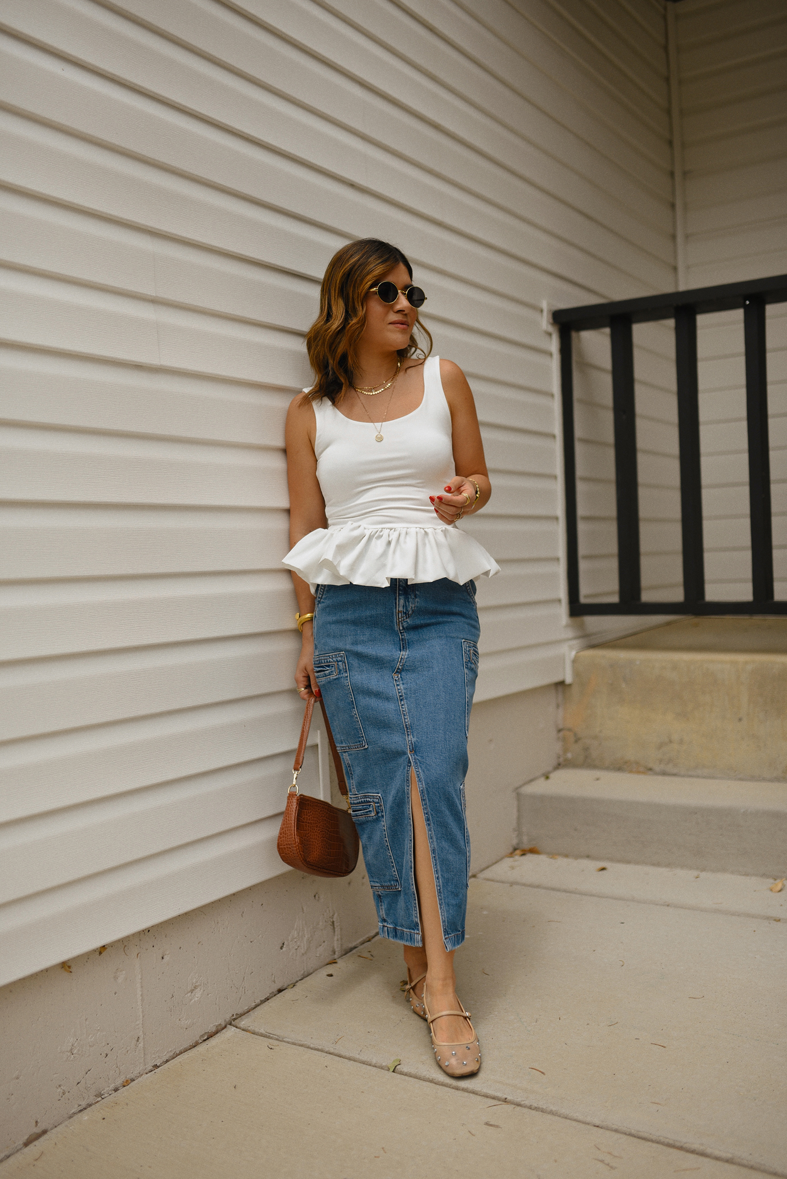 Carolina Hellal of Chic Talk wearing a perfect peplum top via Amazon, Hudson jeans midi cargo skirt, Sam Edelman Mary Jane shoes and Amazon brown shoulder bag