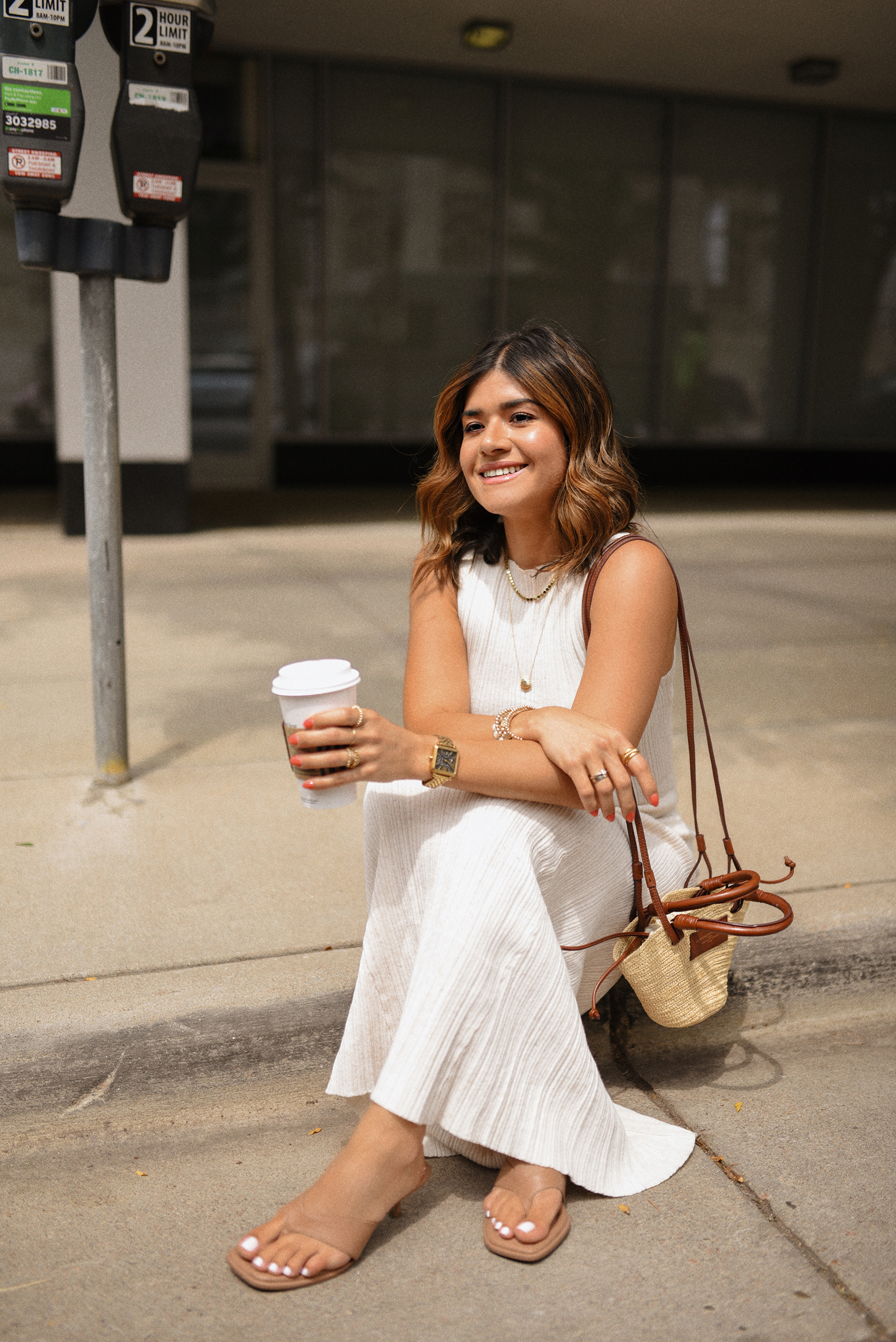 Carolina Hellal of Chic Talk wearing a Target dress and sandals and Sezane handbag