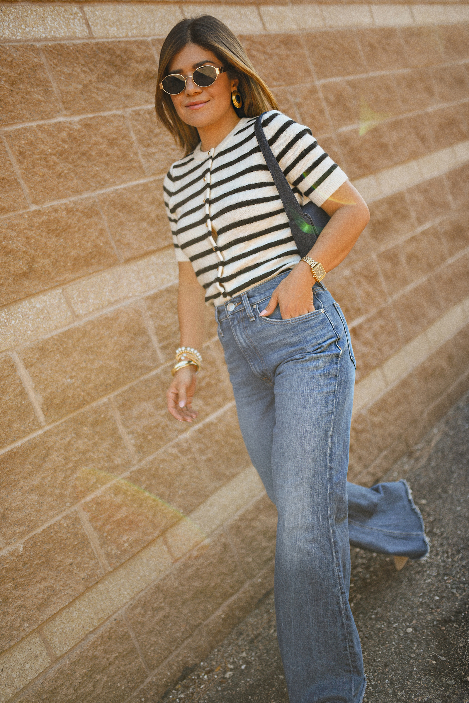 Carolina Hellal of Chic Talk wearing a wide leg jeans vida Hudson, H&M knit cardigan, slingback heels and a LOFT bag