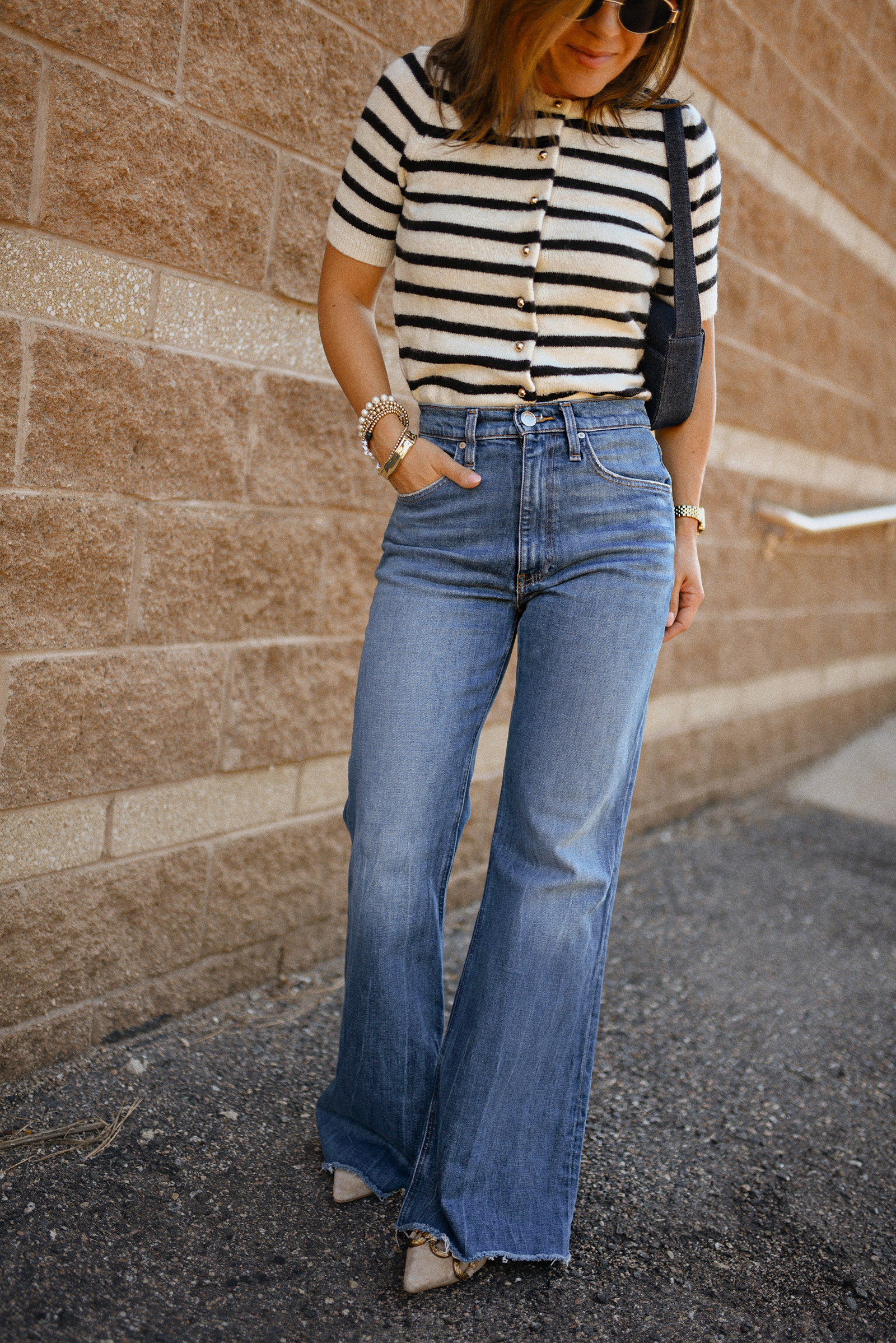 Carolina Hellal of Chic Talk wearing a wide leg jeans vida Hudson, H&M knit cardigan, slingback heels and a LOFT bag