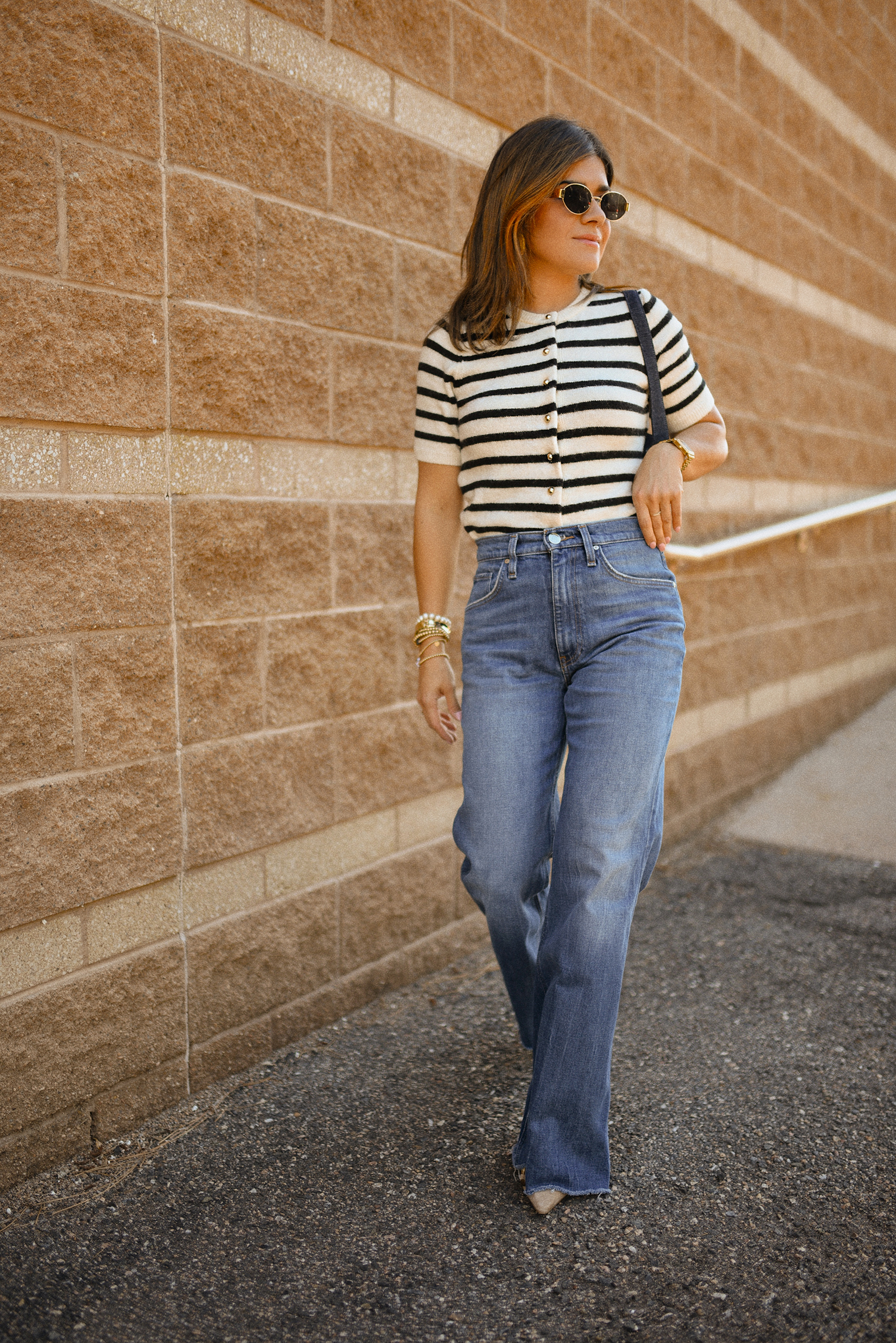 Carolina Hellal of Chic Talk wearing a wide leg jeans vida Hudson, H&M knit cardigan, slingback heels and a LOFT bag