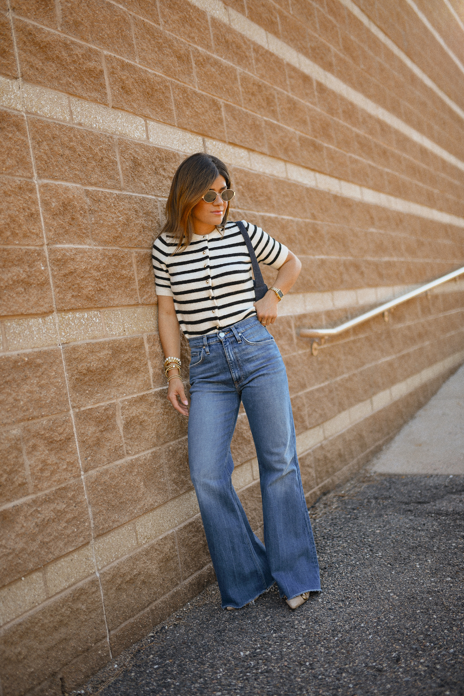 Carolina Hellal of Chic Talk wearing a wide leg jeans vida Hudson, H&M knit cardigan, slingback heels and a LOFT bag