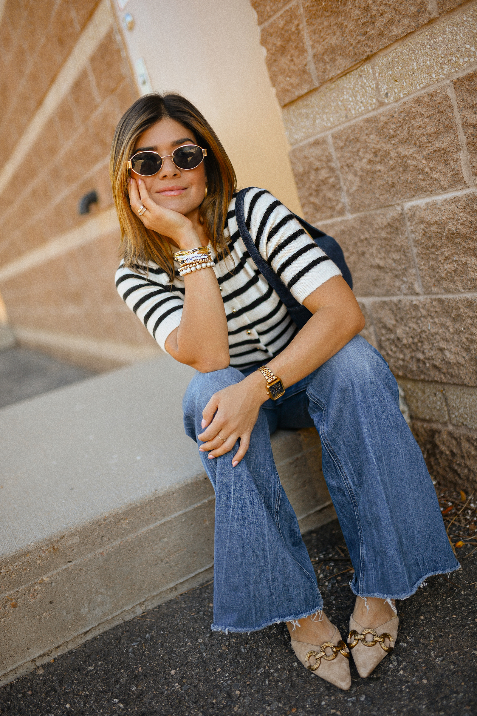 Carolina Hellal of Chic Talk wearing a wide leg jeans vida Hudson, H&M knit cardigan, slingback heels and a LOFT bag