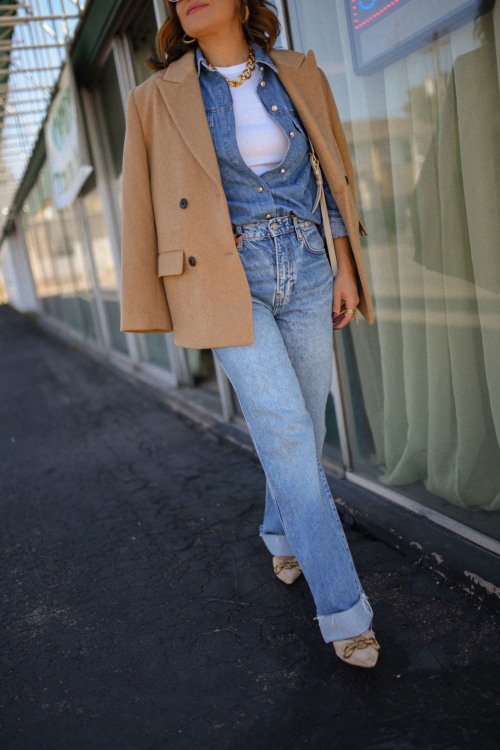 Carolina Hellal of Chic Talk wearing a denim on denim look, shirt via Sezane, wide leg jean from Nordstrom, tank top via Target, Dolce Vita pumps and Jacquemus bag