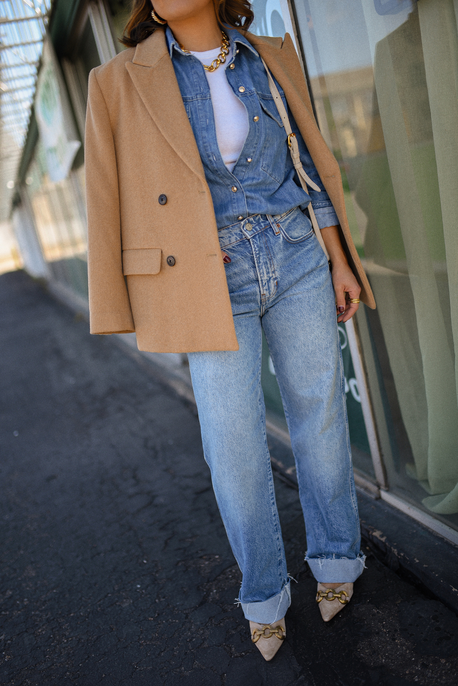 Carolina Hellal of Chic Talk wearing a denim on denim look, shirt via Sezane, wide leg jean from Nordstrom, tank top via Target, Dolce Vita pumps and Jacquemus bag