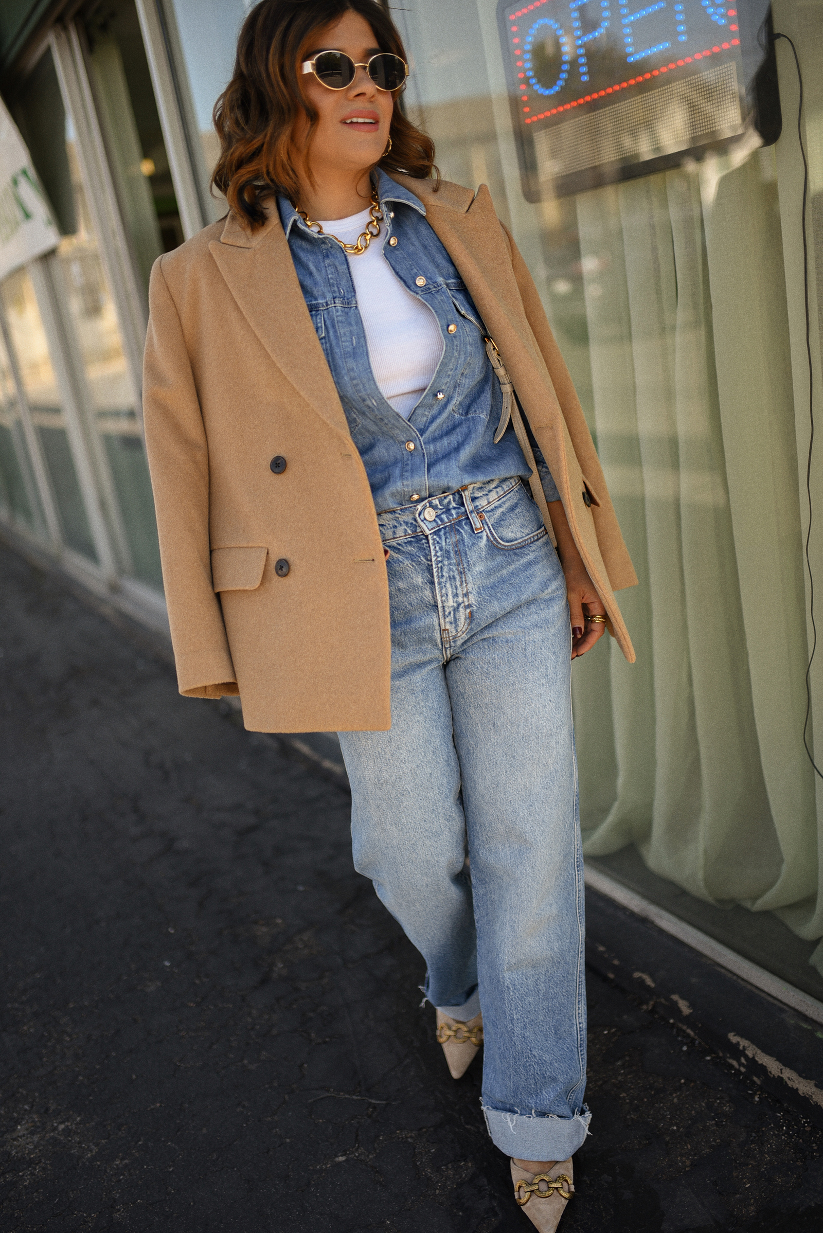 Carolina Hellal of Chic Talk wearing a denim on denim look, shirt via Sezane, wide leg jean from Nordstrom, tank top via Target, Dolce Vita pumps and Jacquemus bag