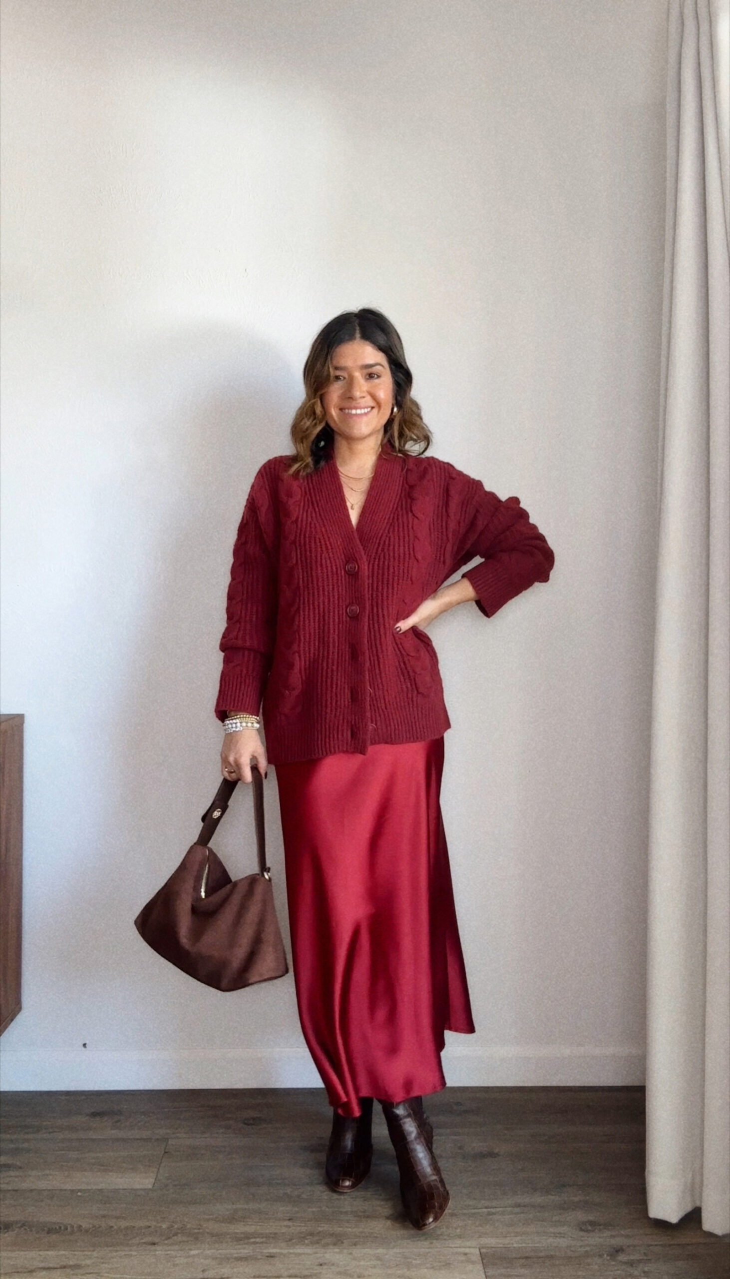 Carolina Hellal of Chic Talk wearing a total look red, skirt and cardigan from Target, brown handbag via Amazon and Nordstrom croc burgundy boots